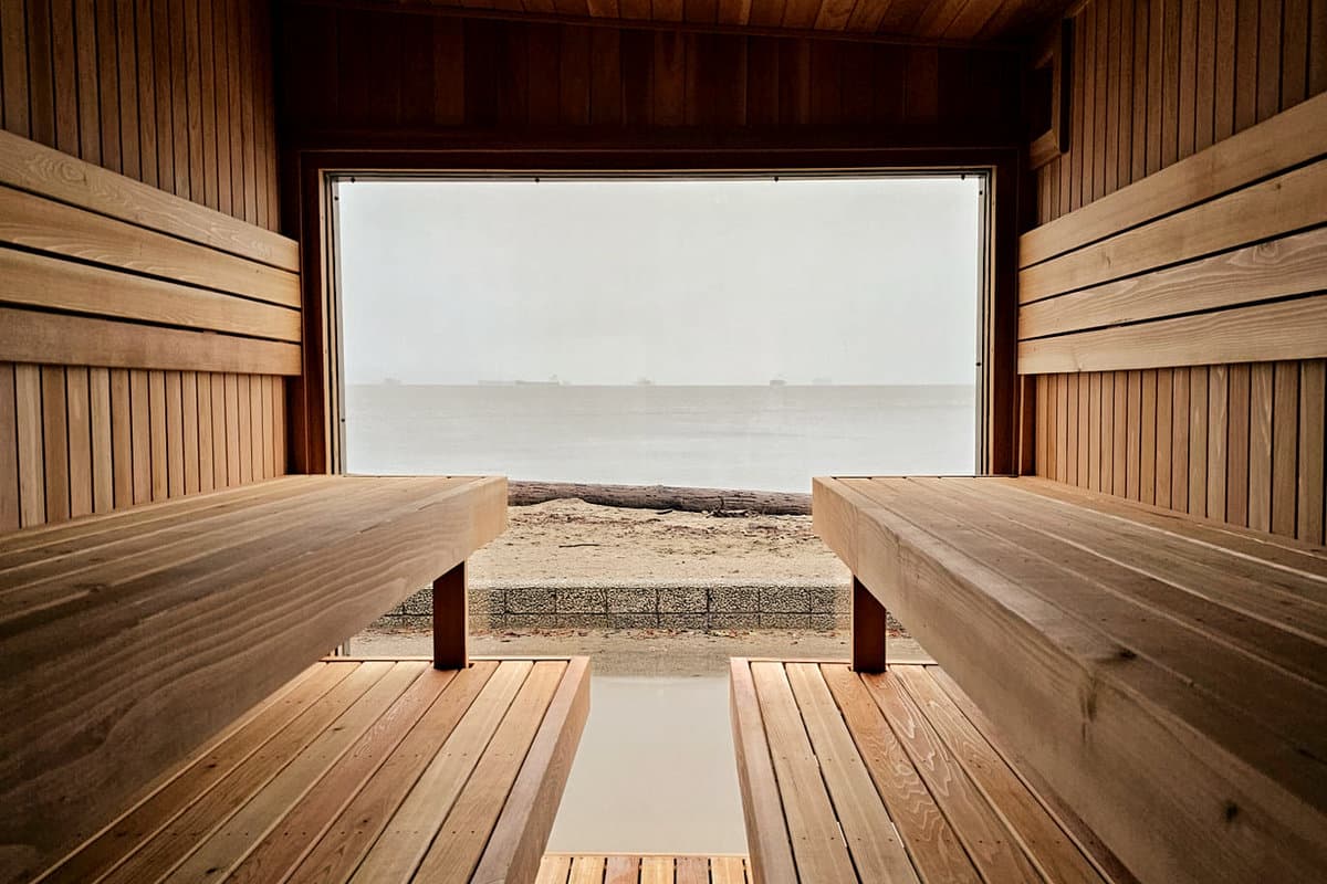 Gatherwell Ambleside sauna interior looking out to the ocean