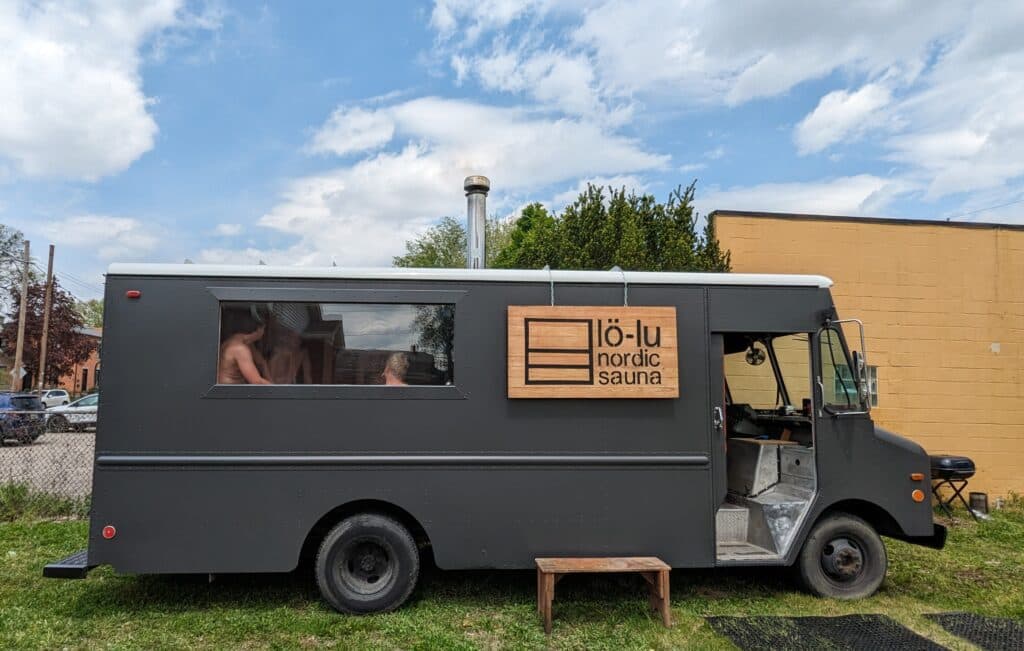Lö-Lu Nordic Sauna converted truck exterior with wood sign in Columbus, Ohio