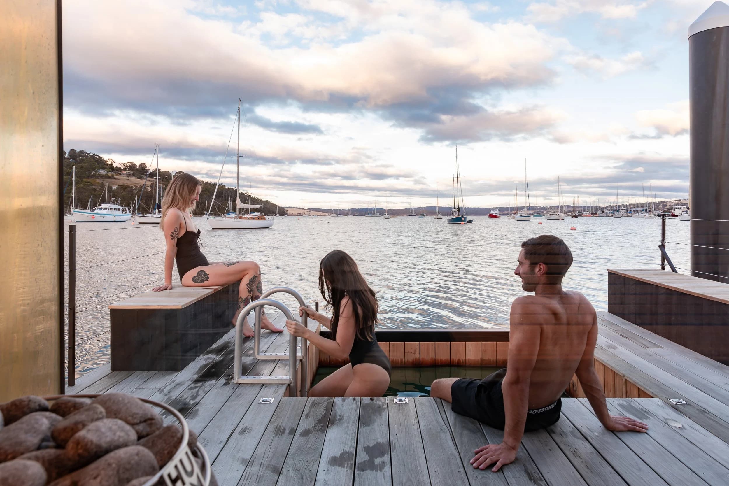 Sauna Boat Tasmania floating sauna on dock at Oyster Cove Marina