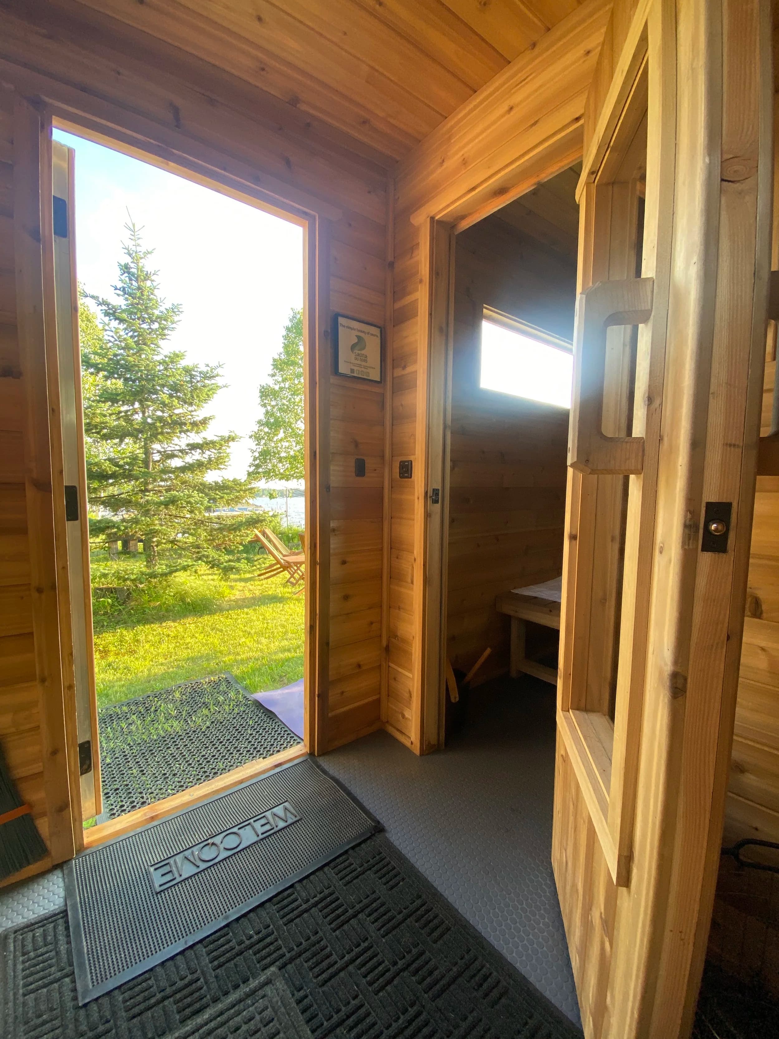 Sauna du Nord cedar changing room looking out to Caribou Lake