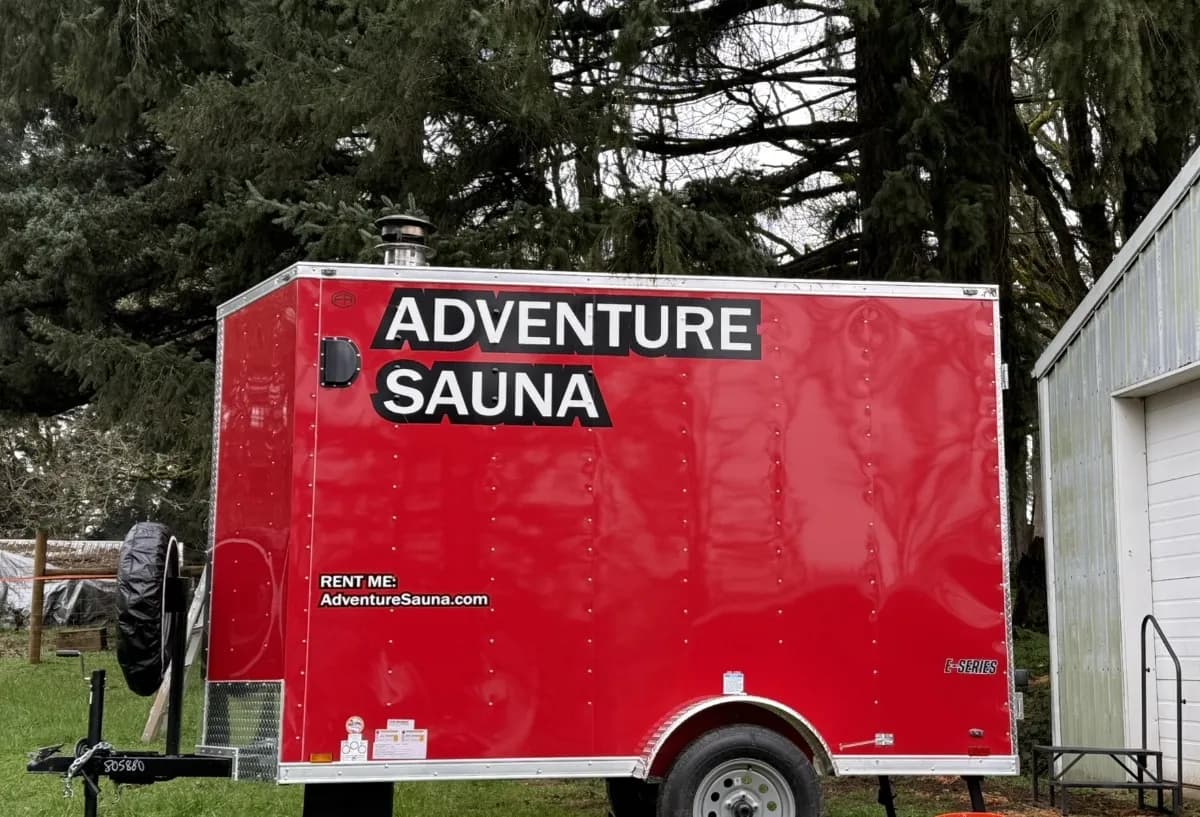 Adventure Sauna mobile wood-fired sauna trailer with cold plunge tub