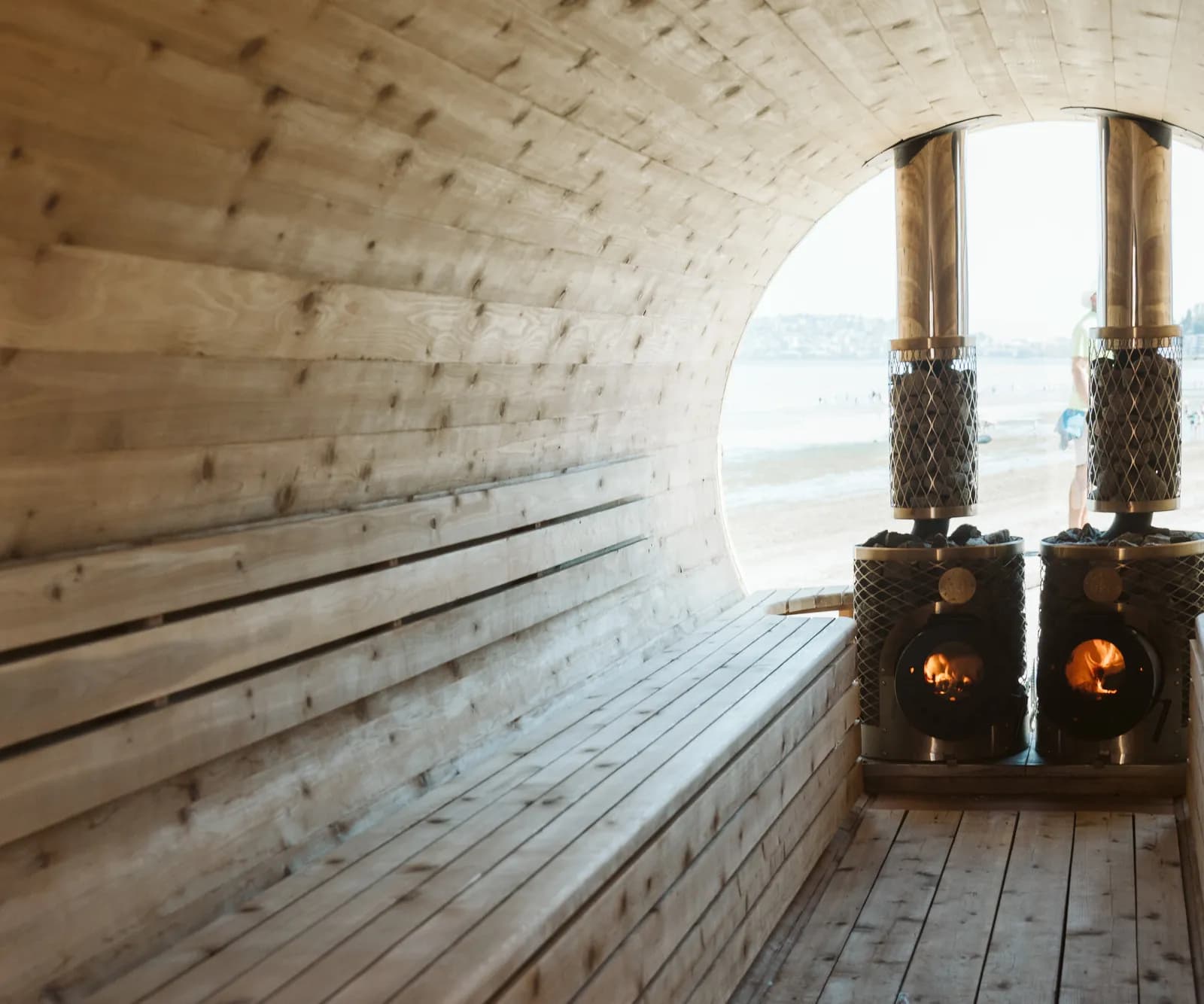 Interior of Bywater Sauna's wood-fired barrel sauna at Leschi in Seattle