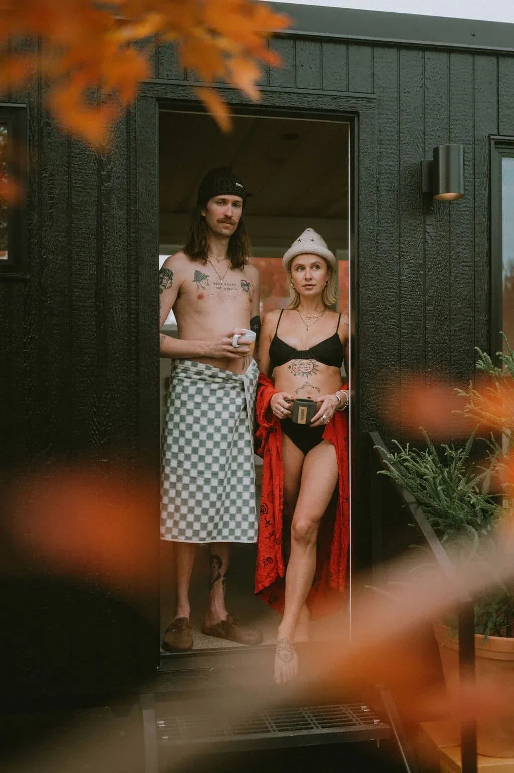 Two guests outside the Nordica Haus sauna on the Hood River waterfront