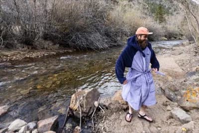 Cold plunge in Clear Creek at Plume Sauna Club