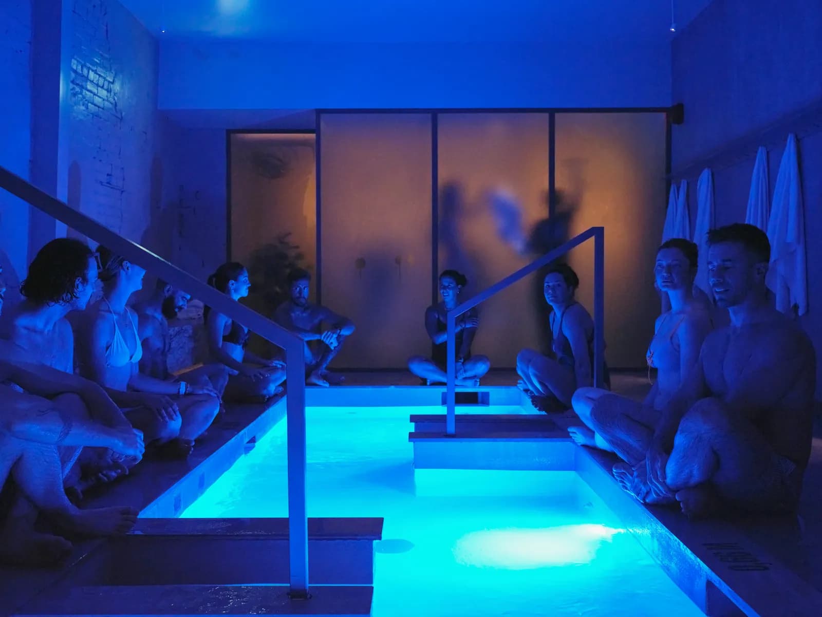 RECESS communal cold plunge pool with blue lighting