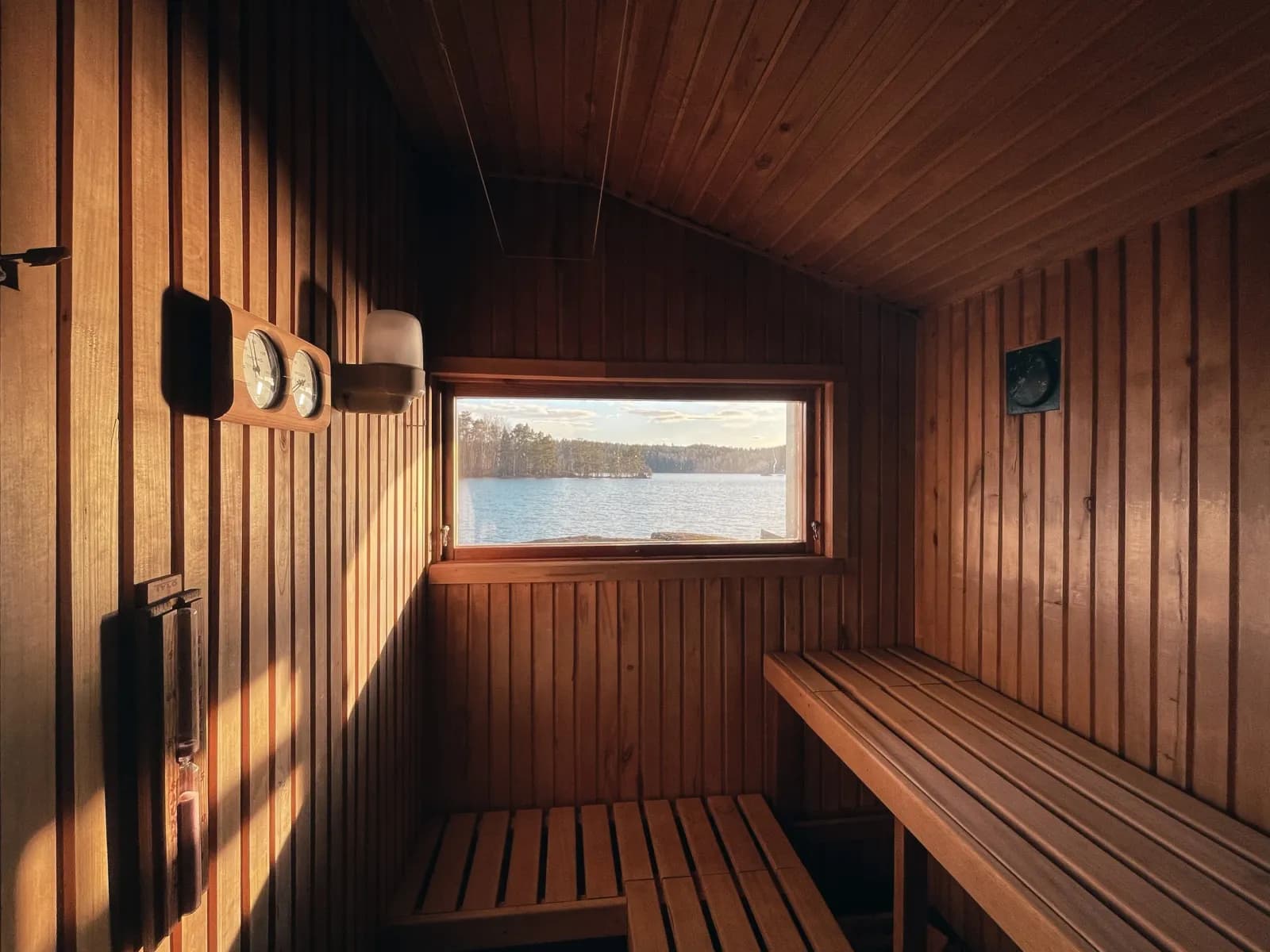 River Birch Nordic Sauna cedar interior with mountain view window