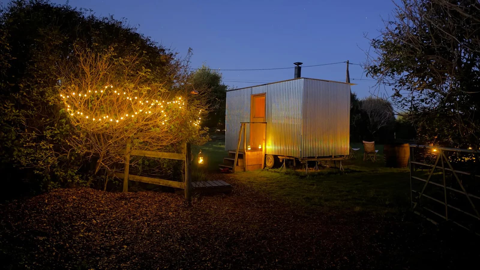 Saltgrass Sauna cabin at dusk at Apron Community Farm