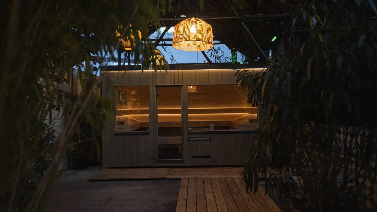 Sauna cabin interior with backlit benches