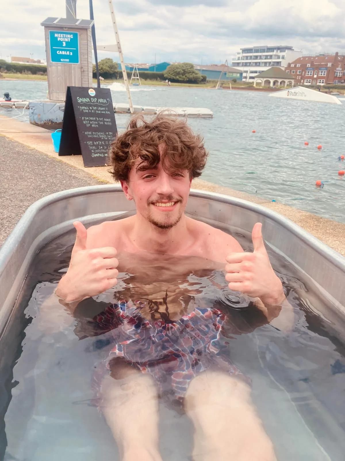 Happy customer at Saunadelic beachside wood-fired sauna