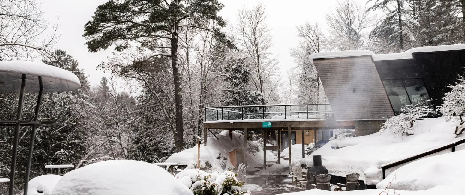 Outdoor thermal baths at Spa Bolton with natural waterfall