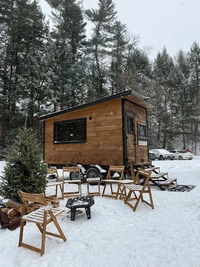 Stella Blue mobile wood-fired sauna trailer in the snow