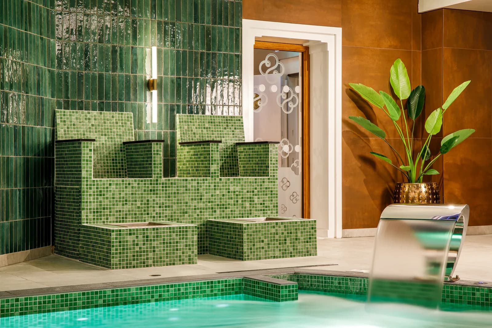 Thermal plunge area with green zellige tile at SubRosa Spa