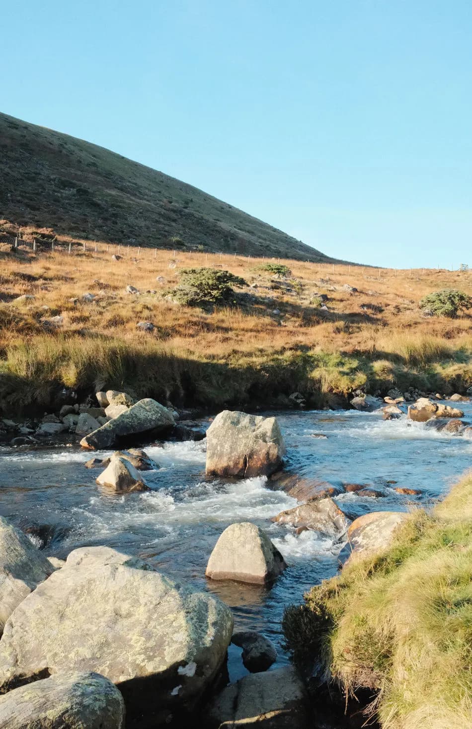 Tarn Saunas mobile wood-fired sauna beside a river in the Lake District