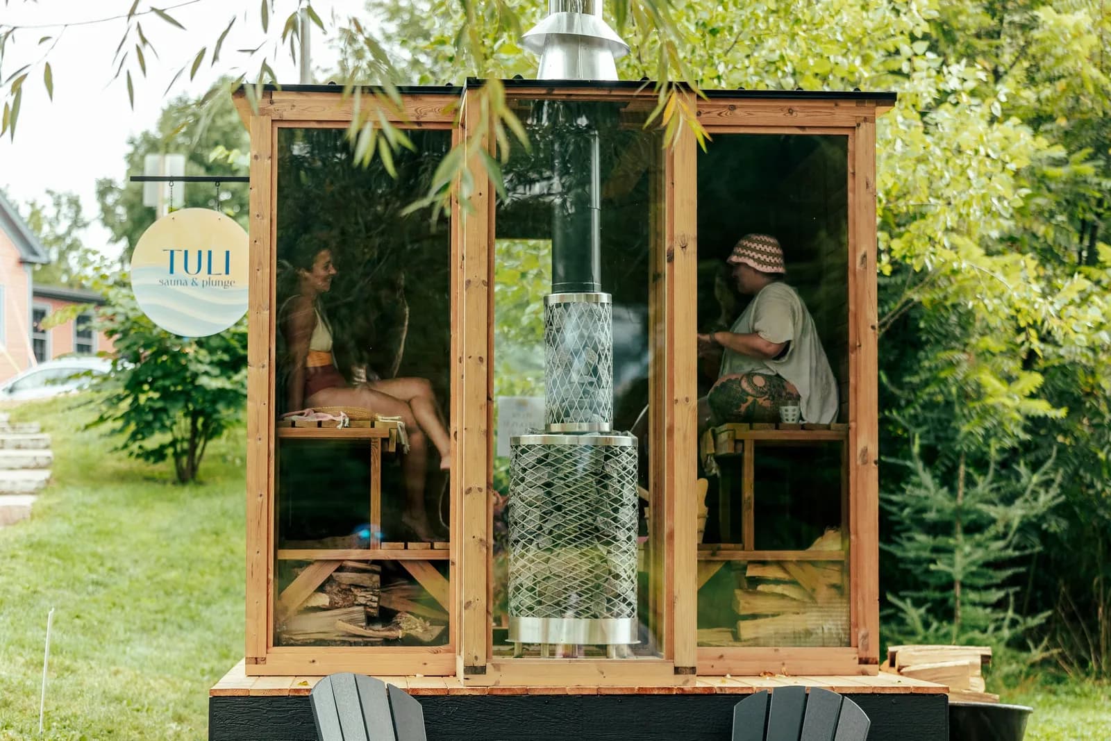 Tuli Sauna and Plunge wood-glass sauna exterior among trees