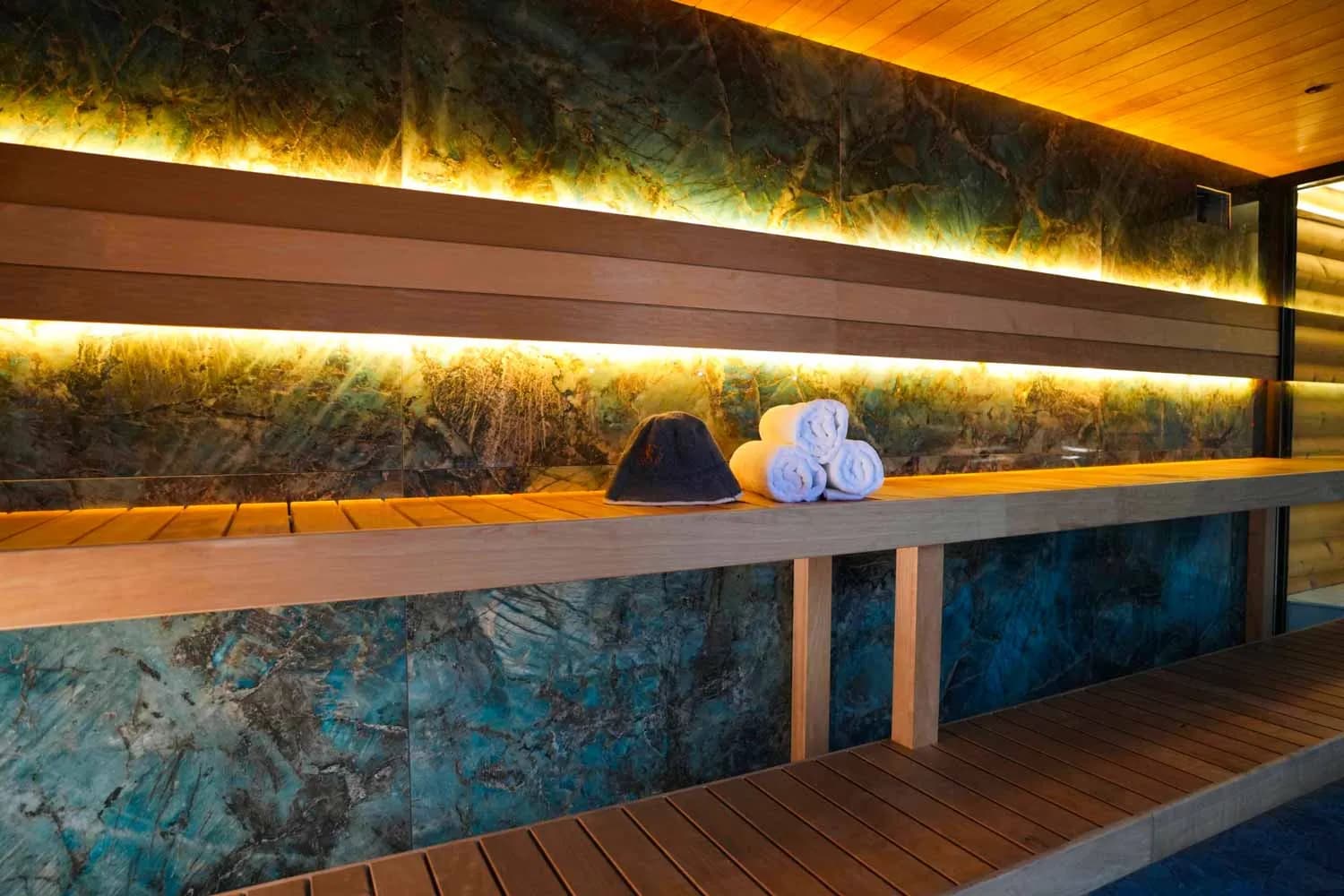 Finnish dry sauna with wooden benches at Fusion Spa & Resort