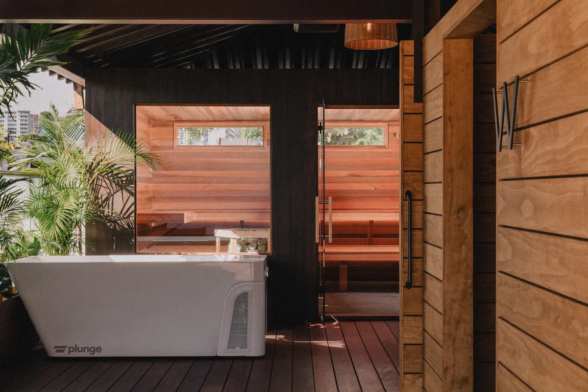 Cedar sauna and Plunge cold tub on the open-air deck at Lava Wellness in Honolulu