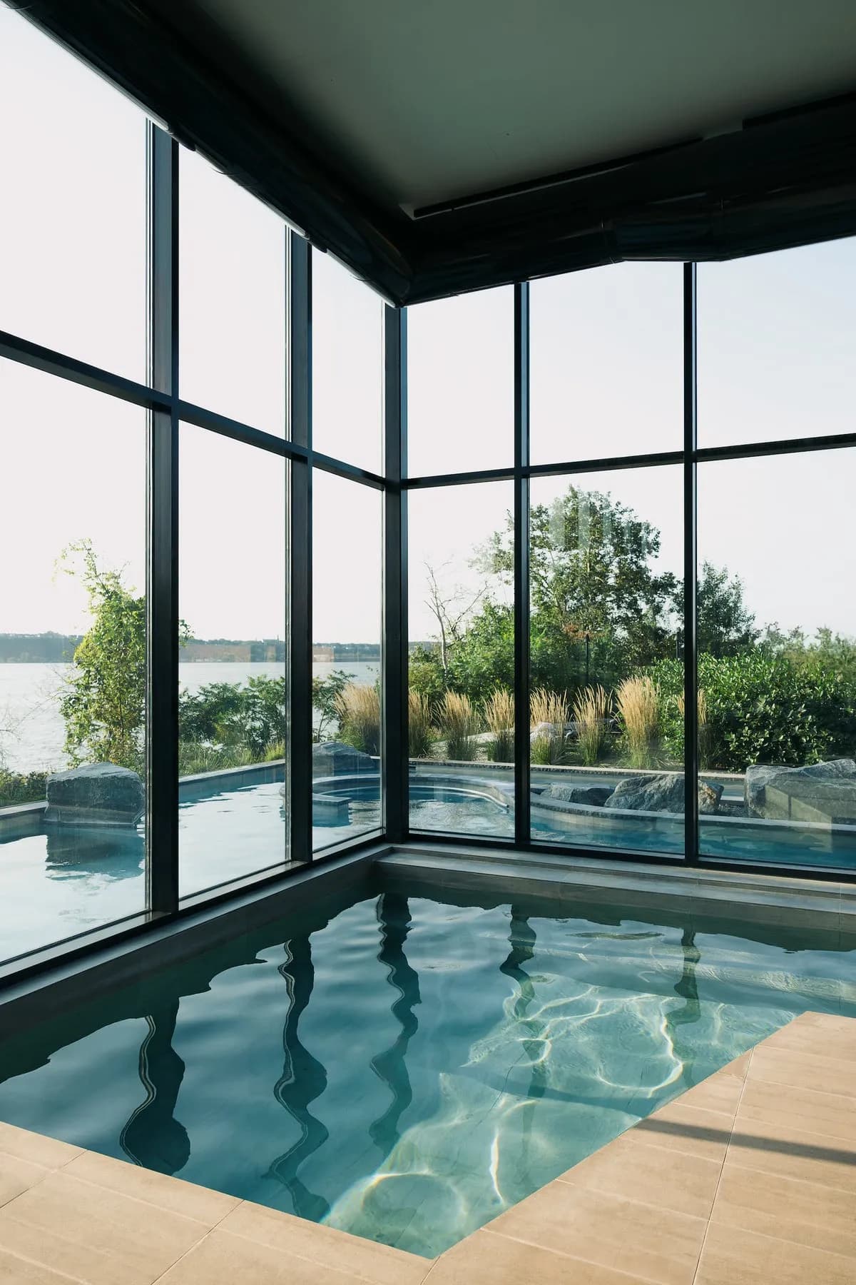 Strøm Spa Vieux-Québec exterior with modern saunas overlooking the Saint Lawrence River